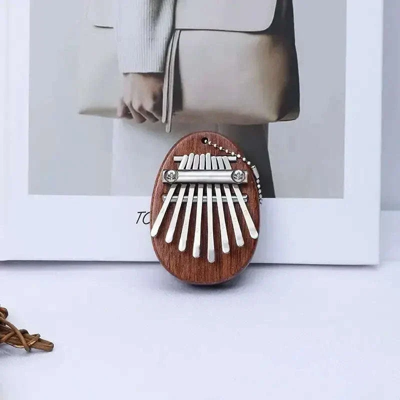 Mini 8-Key Wooden Kalimba Thumb Piano with Pendant Chain - Image 9